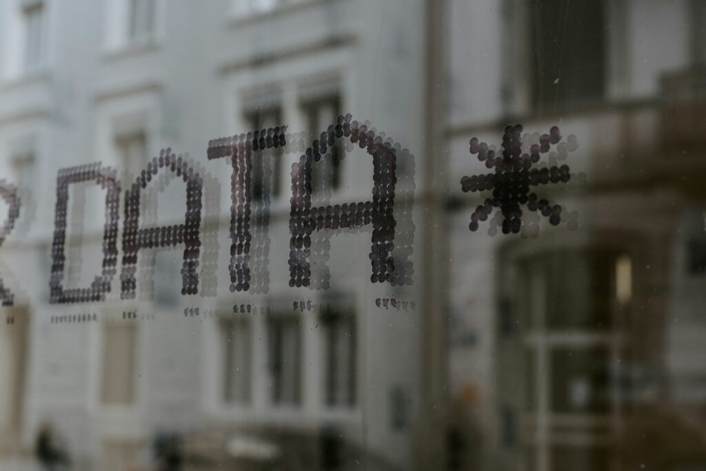 close up of a window of a building with the word data written on it