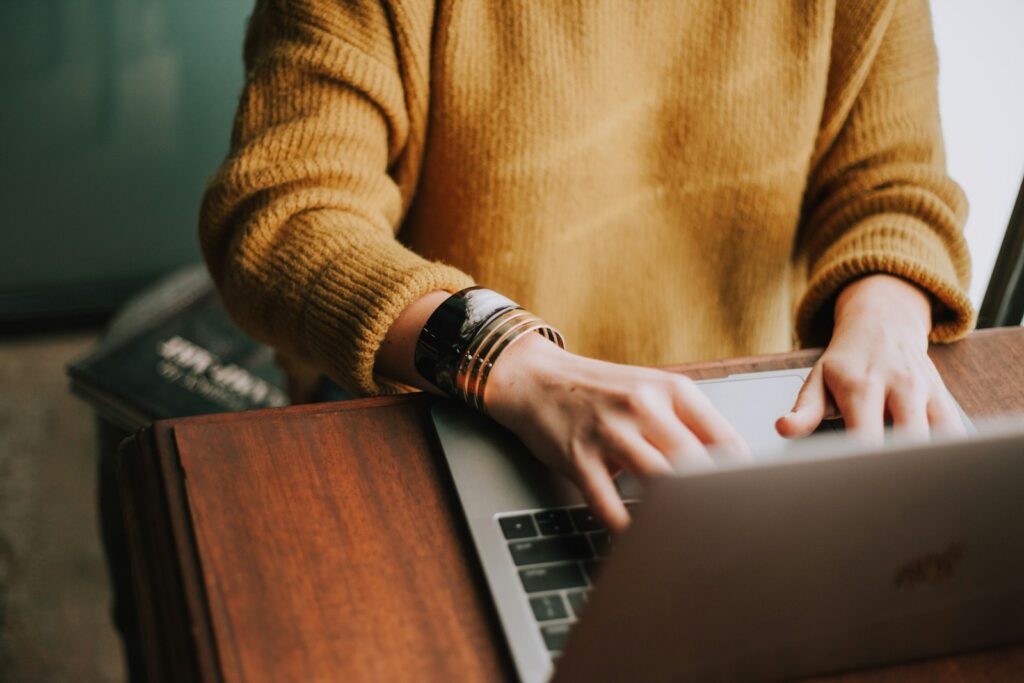 person using laptop computer to search ministays