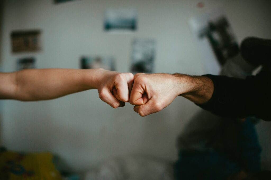 person shaking another persons hand